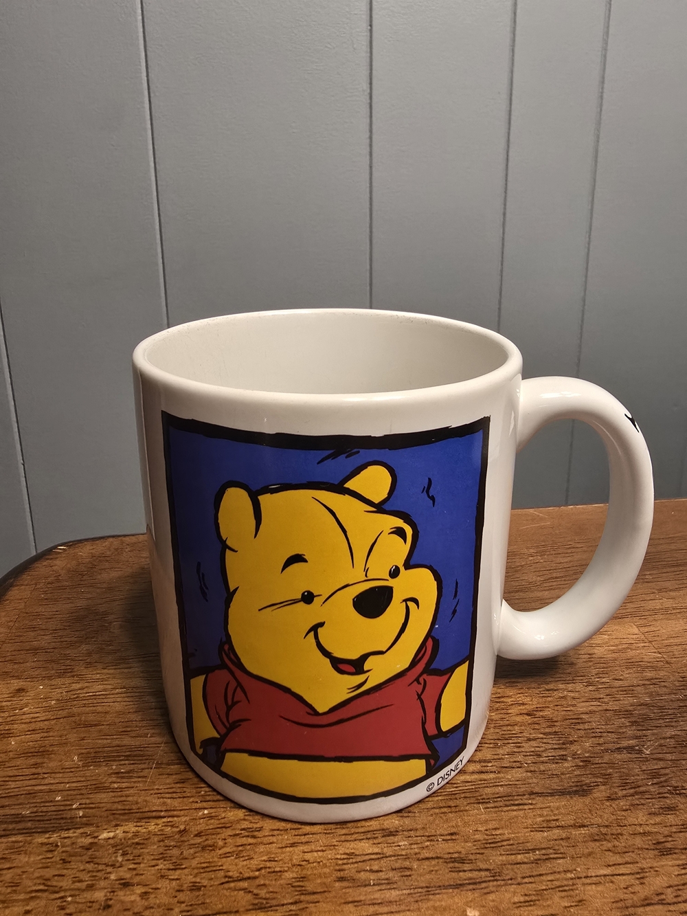 Vintage Disney White Ceramic Mug with Yellow Winnie the Pooh and Blue Panel